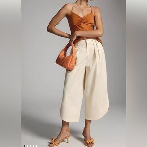 Mare Mare x Anthropologie Curved-Hem Chino Pants in light beige wide leg cropped